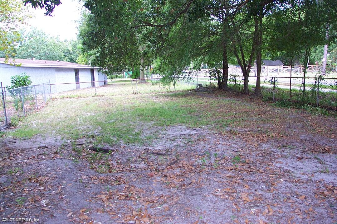 7580 Proxima Road Jacksonville, FL 32210 - Photo 17 of 19 Large fenced side yard