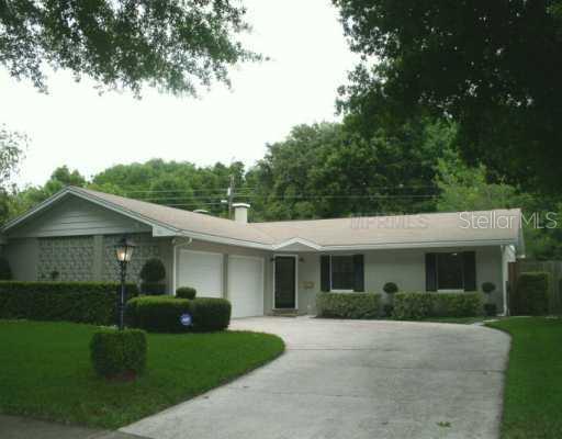 121 Cornwall Road Winter Park, FL 32792 - Photo 1 of 1 front view of a house with a yard