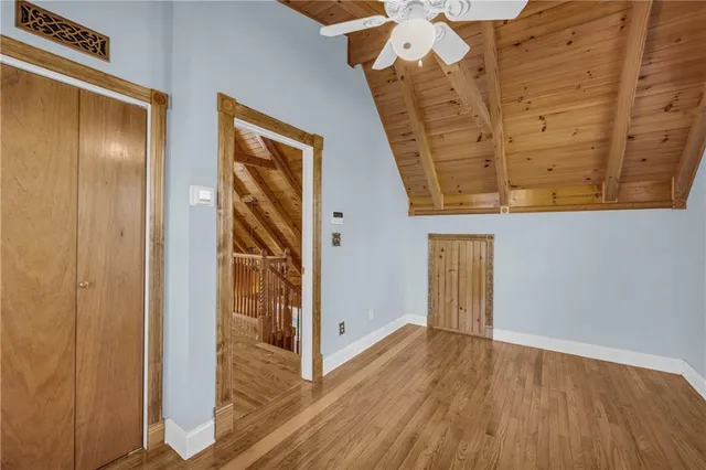 a view of front door with wooden floor