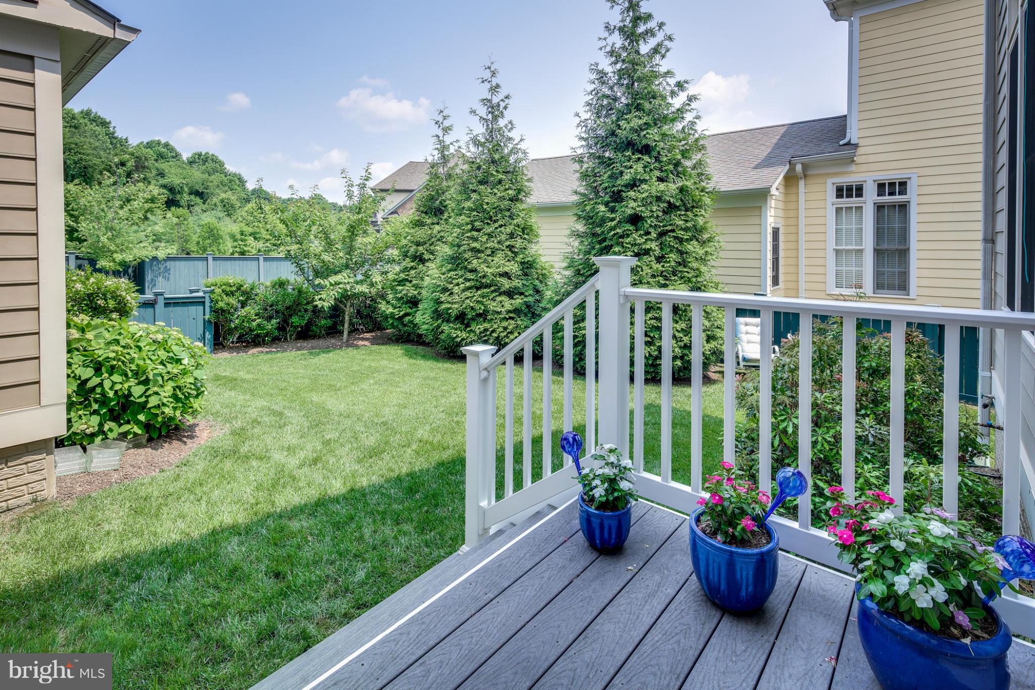 7706 Elmwood Road Fulton, MD 20759 - Photo 18 of 30 a view of a deck with furniture and garden