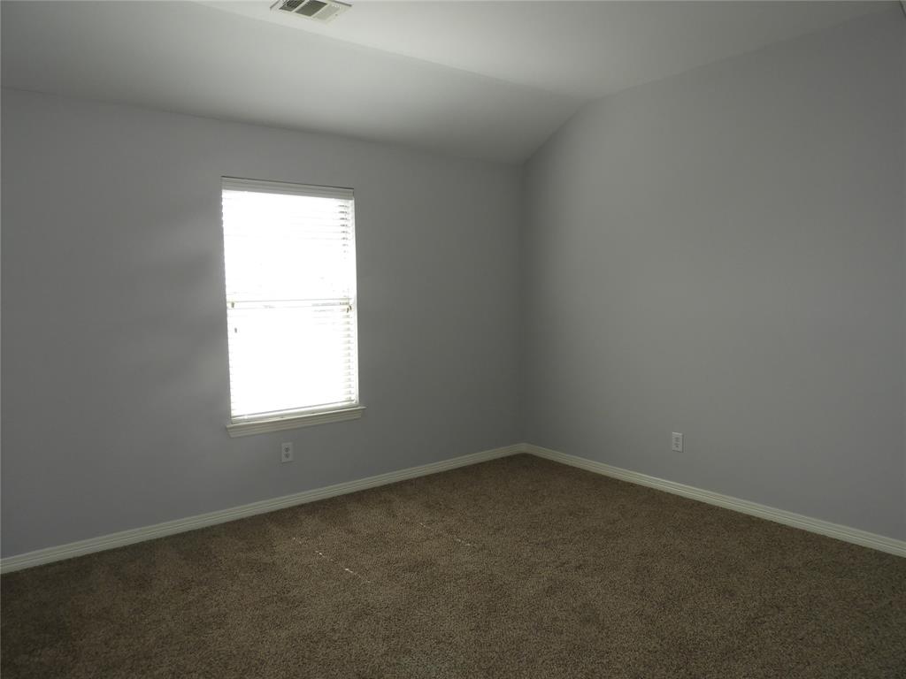 5812 Quicksilver Drive McKinney, TX 75070 - Photo 12 of 17 an empty room with a window
