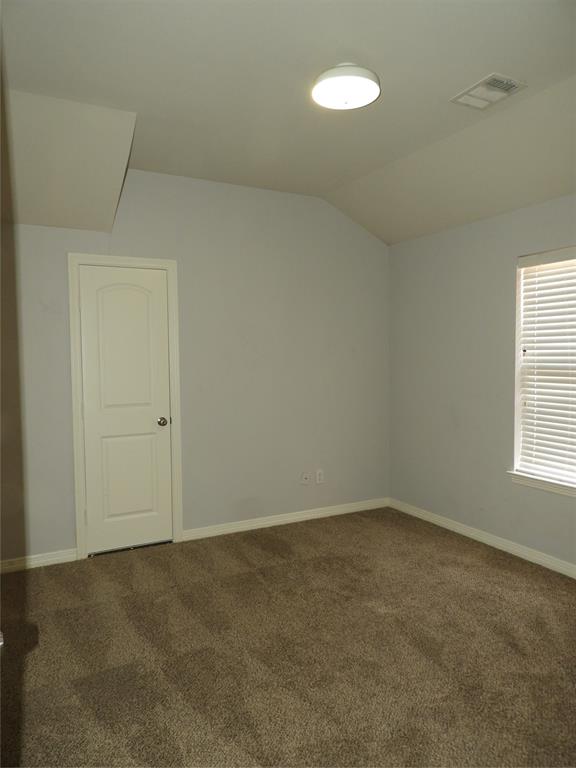 5812 Quicksilver Drive McKinney, TX 75070 - Photo 13 of 17 an empty room with a empty space and a window
