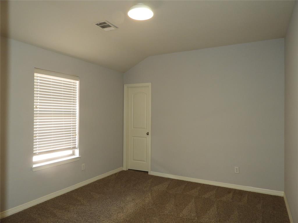 5812 Quicksilver Drive McKinney, TX 75070 - Photo 14 of 17 an empty room with a window