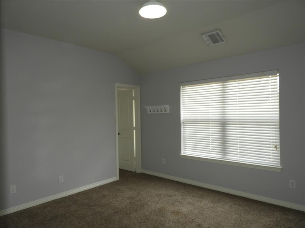 5812 Quicksilver Drive McKinney, TX 75070 - Photo 15 of 17 an empty room with a window
