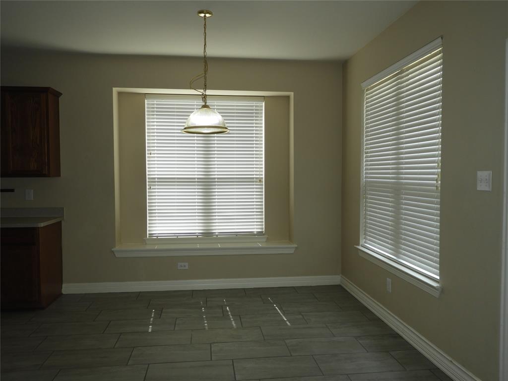 5812 Quicksilver Drive McKinney, TX 75070 - Photo 8 of 17 a view of an empty room with a window