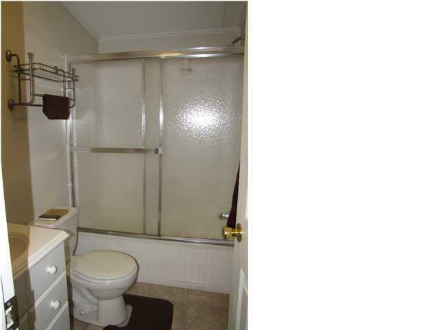 261 Wee Acres Road DeFuniak Springs, FL 32433 - Photo 8 of 21 a bathroom with a toilet and a shower