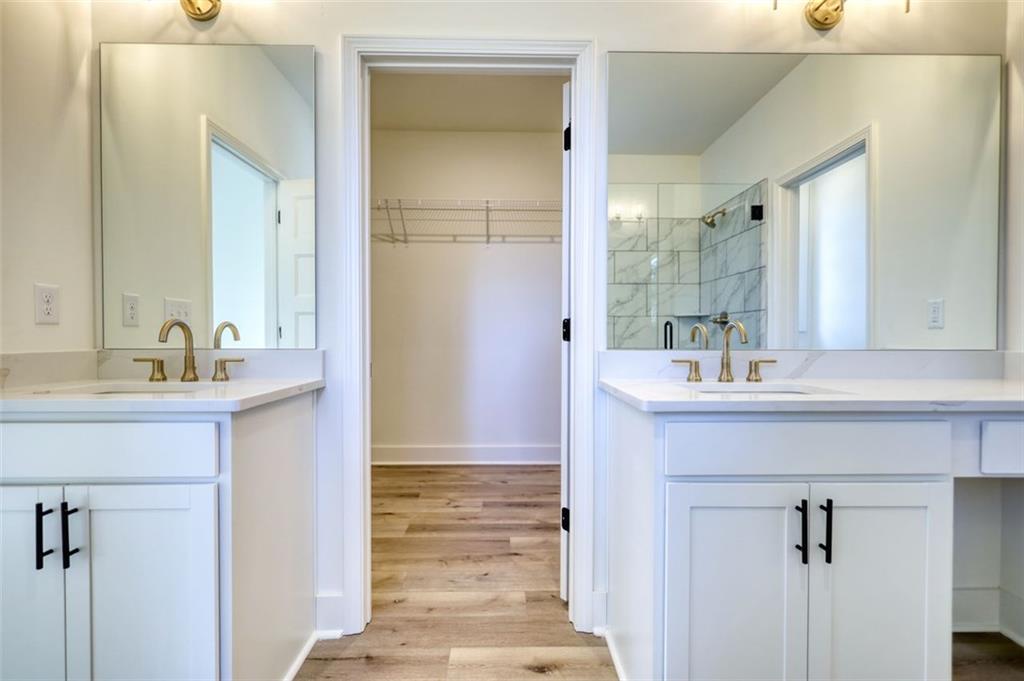 160 Loyd Road Mansfield, GA 30055 - Photo 47 of 82 a bathroom with a sink and a mirror