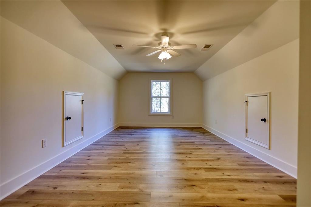 160 Loyd Road Mansfield, GA 30055 - Photo 57 of 82 a view of an empty room with wooden floor and a window