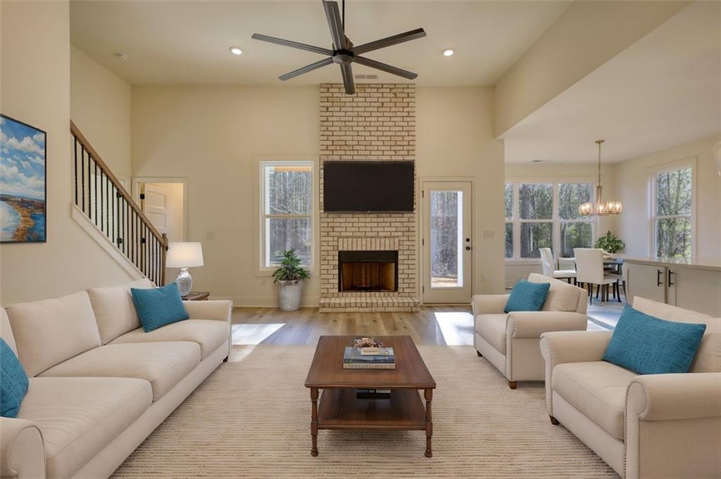 160 Loyd Road Mansfield, GA 30055 - Photo 66 of 82 a living room with furniture and a fireplace