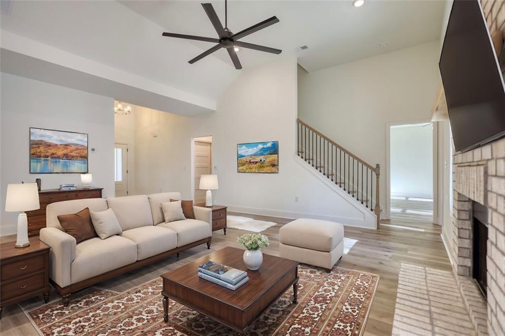160 Loyd Road Mansfield, GA 30055 - Photo 67 of 82 a living room with furniture a rug and a flat screen tv