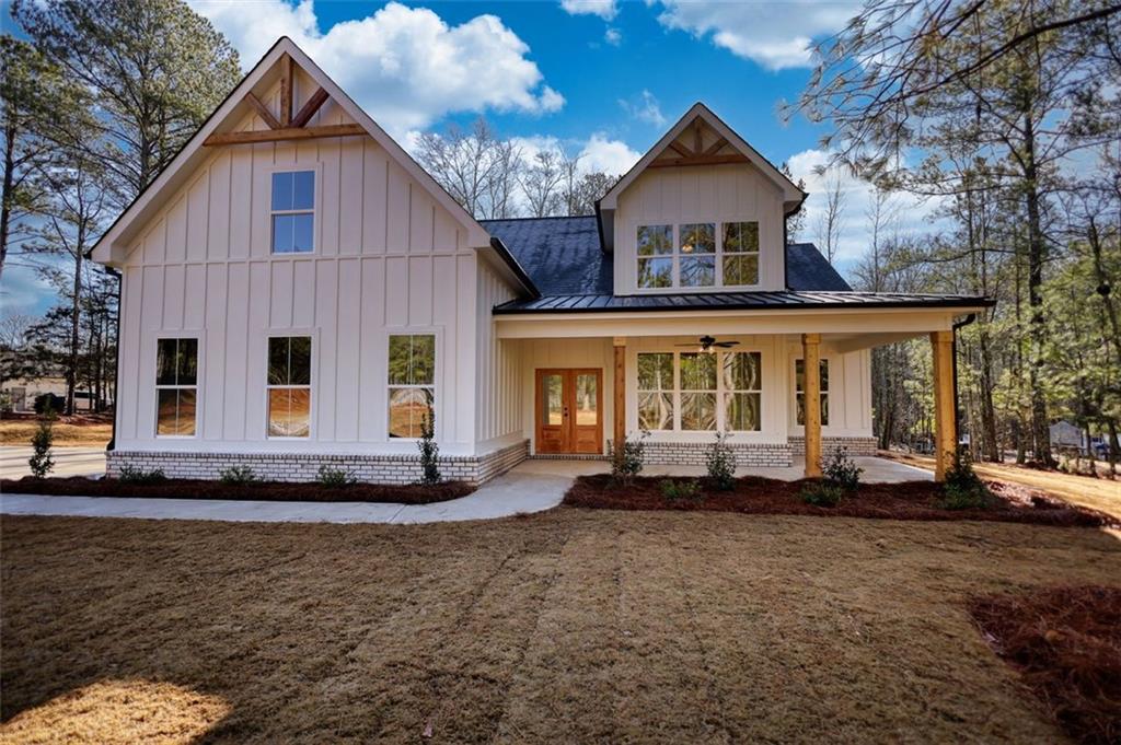 160 Loyd Road Mansfield, GA 30055 - Photo 9 of 82 a front view of a house with a yard