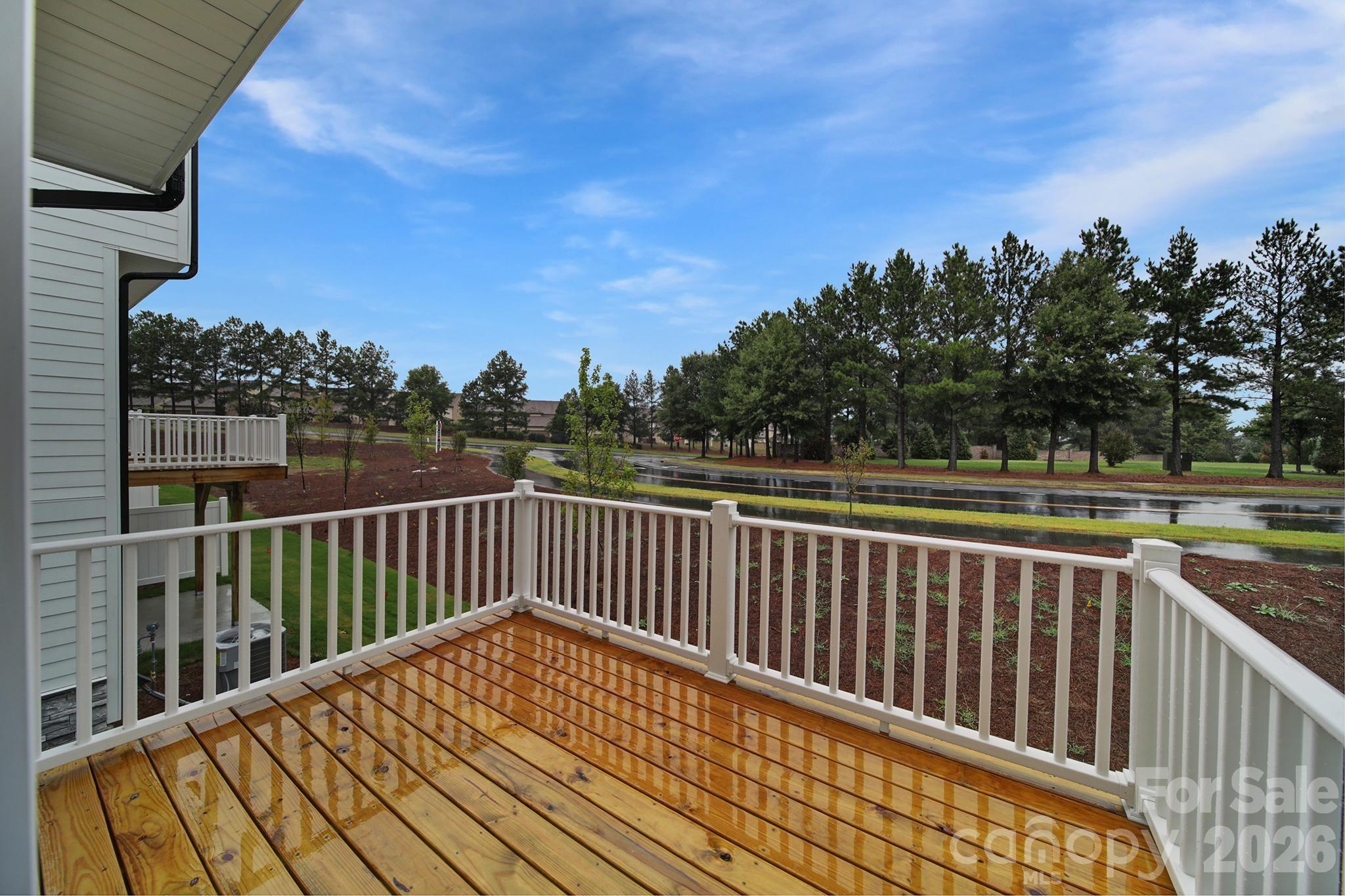 9220 Walnut Hl Road Northwest Concord, NC 28027 - Photo 14 of 14 a view of balcony with wooden floor and fence