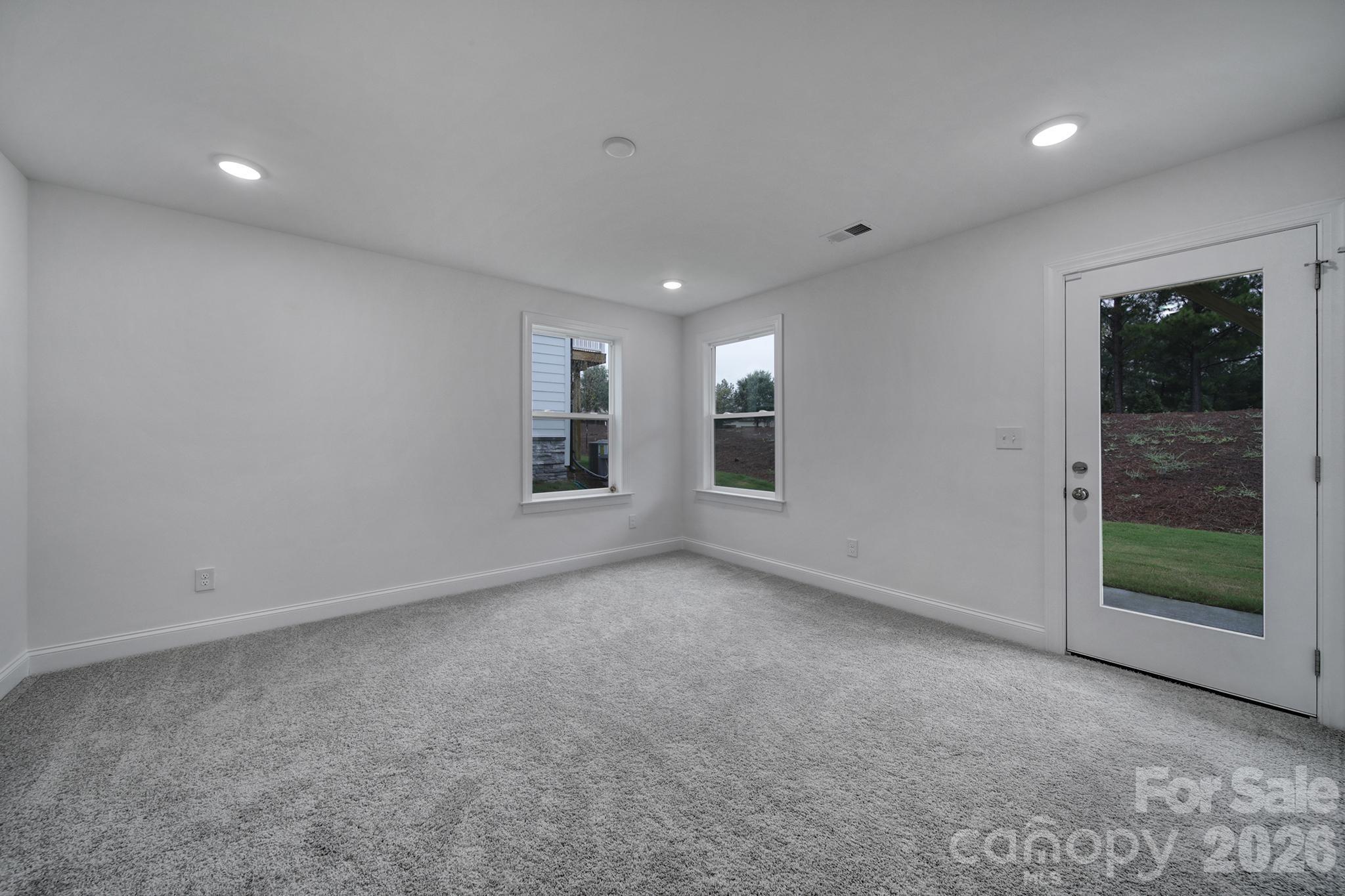 9220 Walnut Hl Road Northwest Concord, NC 28027 - Photo 3 of 14 a view of empty room with window