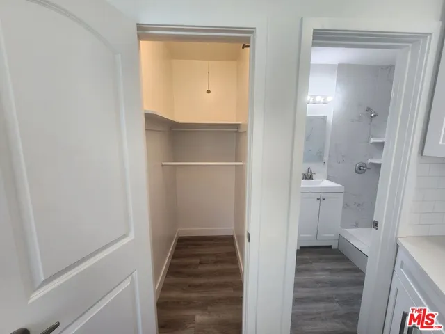 a view of a bathroom from a hallway with toilet