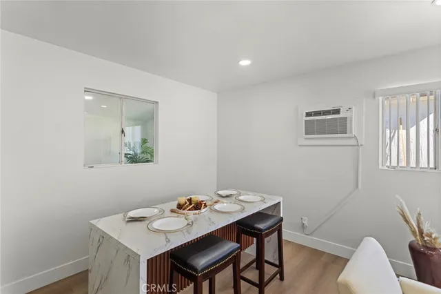 a view of a workspace with furniture