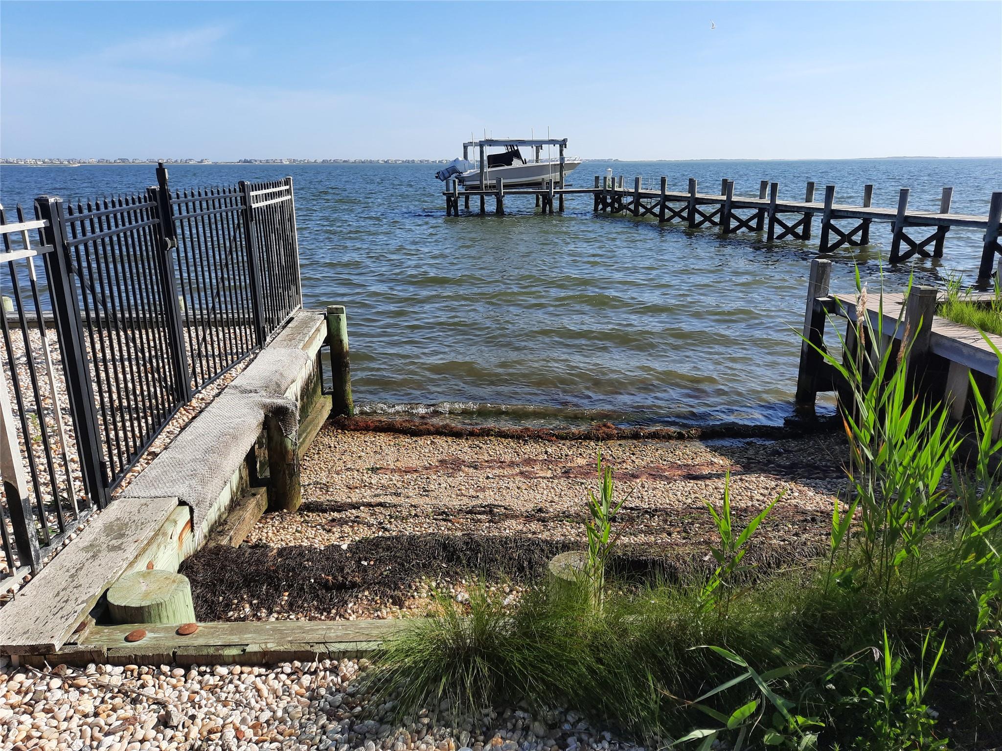 17 Club Lane Remsenburg, NY 11960 - Photo 14 of 15 a view of a ocean from a balcony
