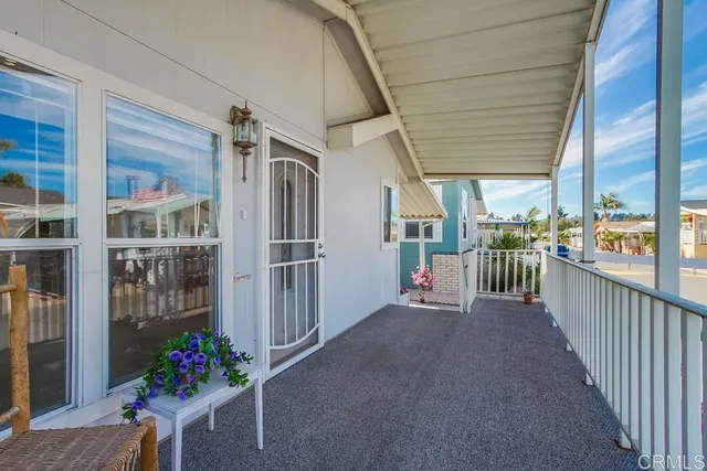 a view of a swimming pool with a lounge chair