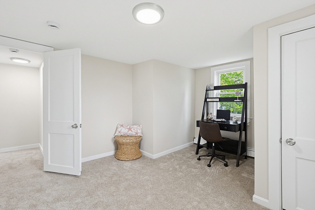 24 Otis Road Barnstable, MA 02601 - Photo 29 of 33 a view of a workspace with furniture and a window