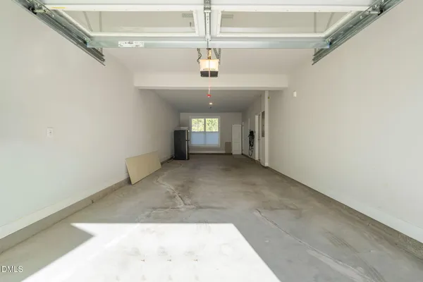 a view of a hallway with a chandelier