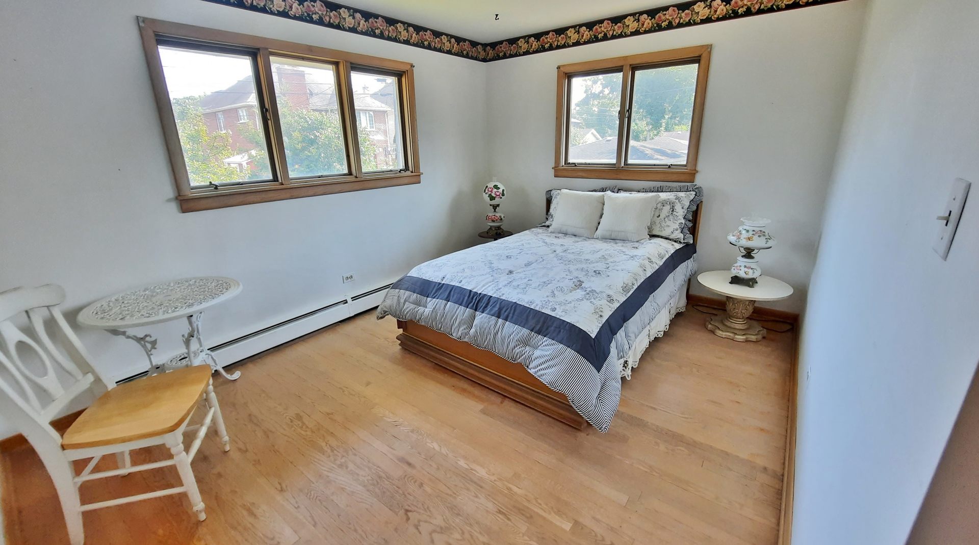 423 North Aldine Avenue Park Ridge, IL 60068 - Photo 16 of 25 a bedroom with a bed and window