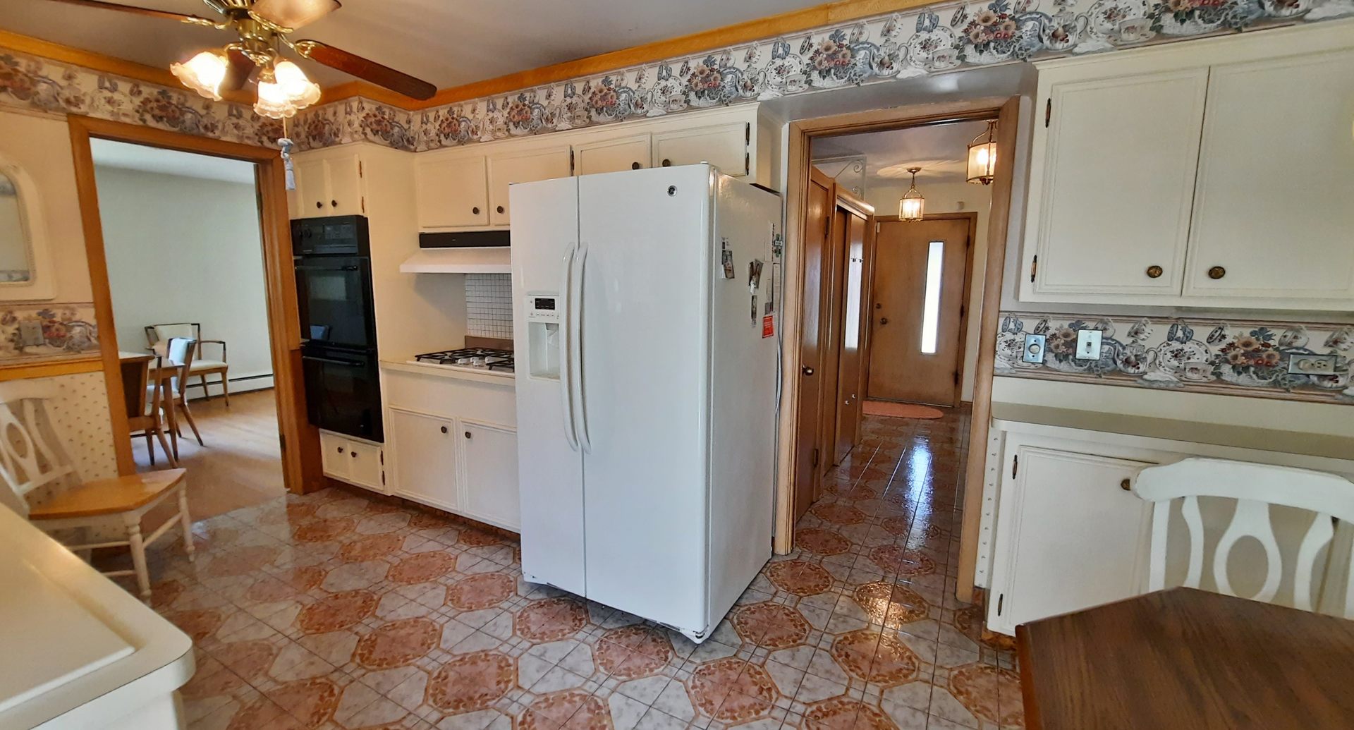 423 North Aldine Avenue Park Ridge, IL 60068 - Photo 6 of 25 a kitchen with stainless steel appliances granite countertop a refrigerator and a sink