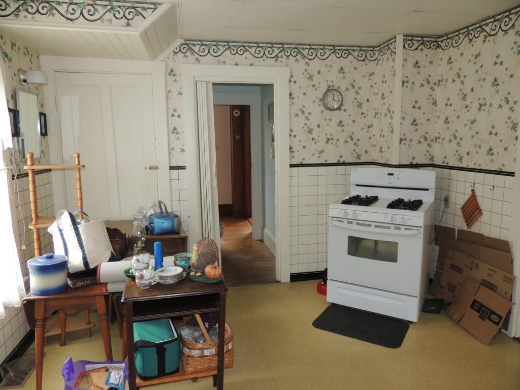 19 Eggemoggin Road Little Deer Isle, ME 04650 - Photo 7 of 24 Door to left leads to basement....