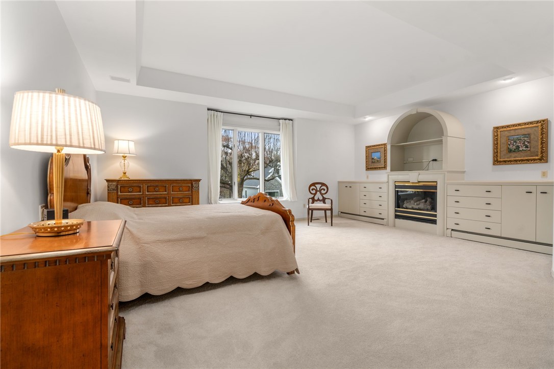 7 Oak Tree Lane Cranston, RI 02920 - Photo 15 of 32 Wall of Built-ins with gas fireplace on the main level