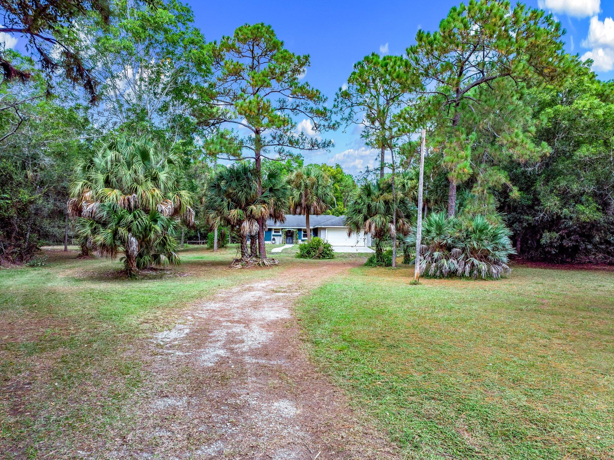 17645 Winterhawk Trail Jupiter, FL 33478 - Photo 3 of 45 FRONT DRIVE