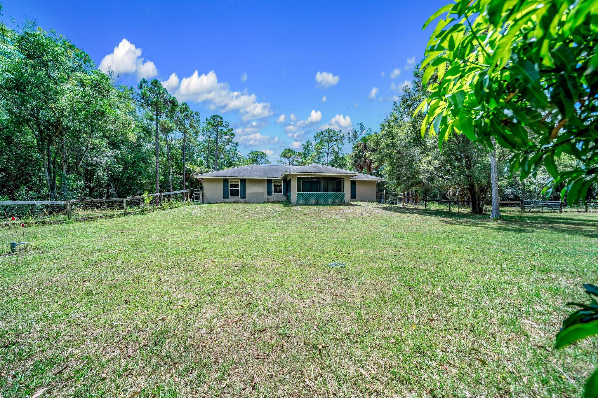 17645 Winterhawk Trail Jupiter, FL 33478 - Photo 4 of 45 BACK OF HOUSE