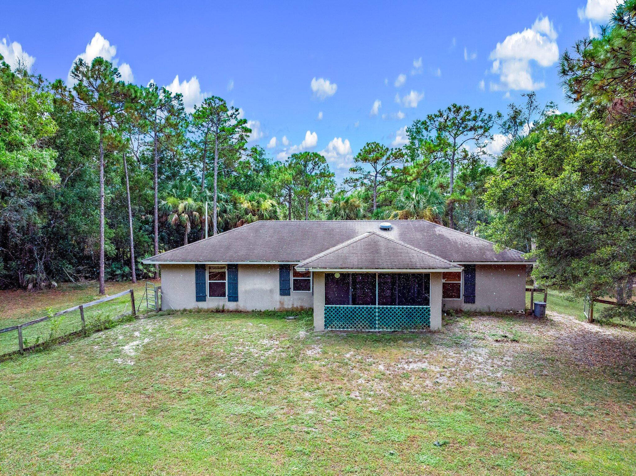 17645 Winterhawk Trail Jupiter, FL 33478 - Photo 9 of 45 BACK OF HOUSE