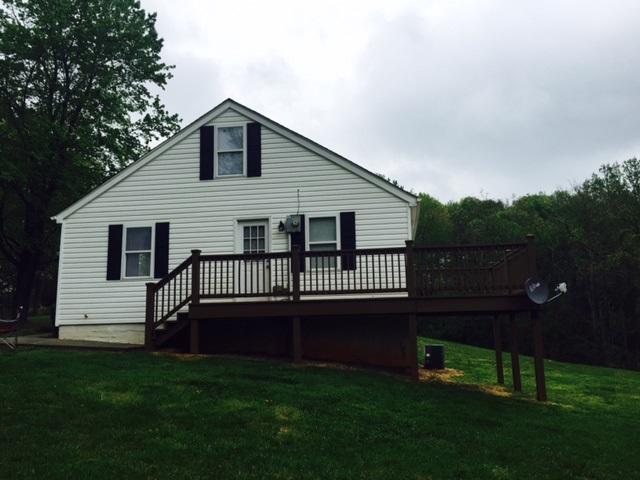 10153 Goodview Road Goodview, VA 24095 - Photo 2 of 15 a view of a house with a yard chairs and a yard