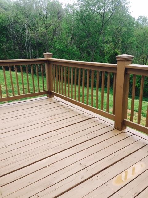 10153 Goodview Road Goodview, VA 24095 - Photo 13 of 15 a view of balcony with deck and wooden floor