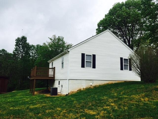 10153 Goodview Road Goodview, VA 24095 - Photo 15 of 15 a view of a house with a yard
