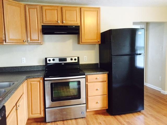 10153 Goodview Road Goodview, VA 24095 - Photo 3 of 15 a kitchen with stainless steel appliances granite countertop a refrigerator and a stove
