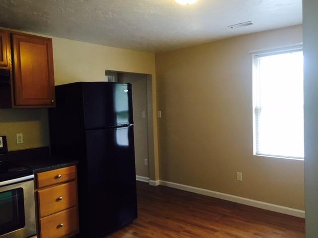 10153 Goodview Road Goodview, VA 24095 - Photo 5 of 15 a kitchen with a refrigerator and window