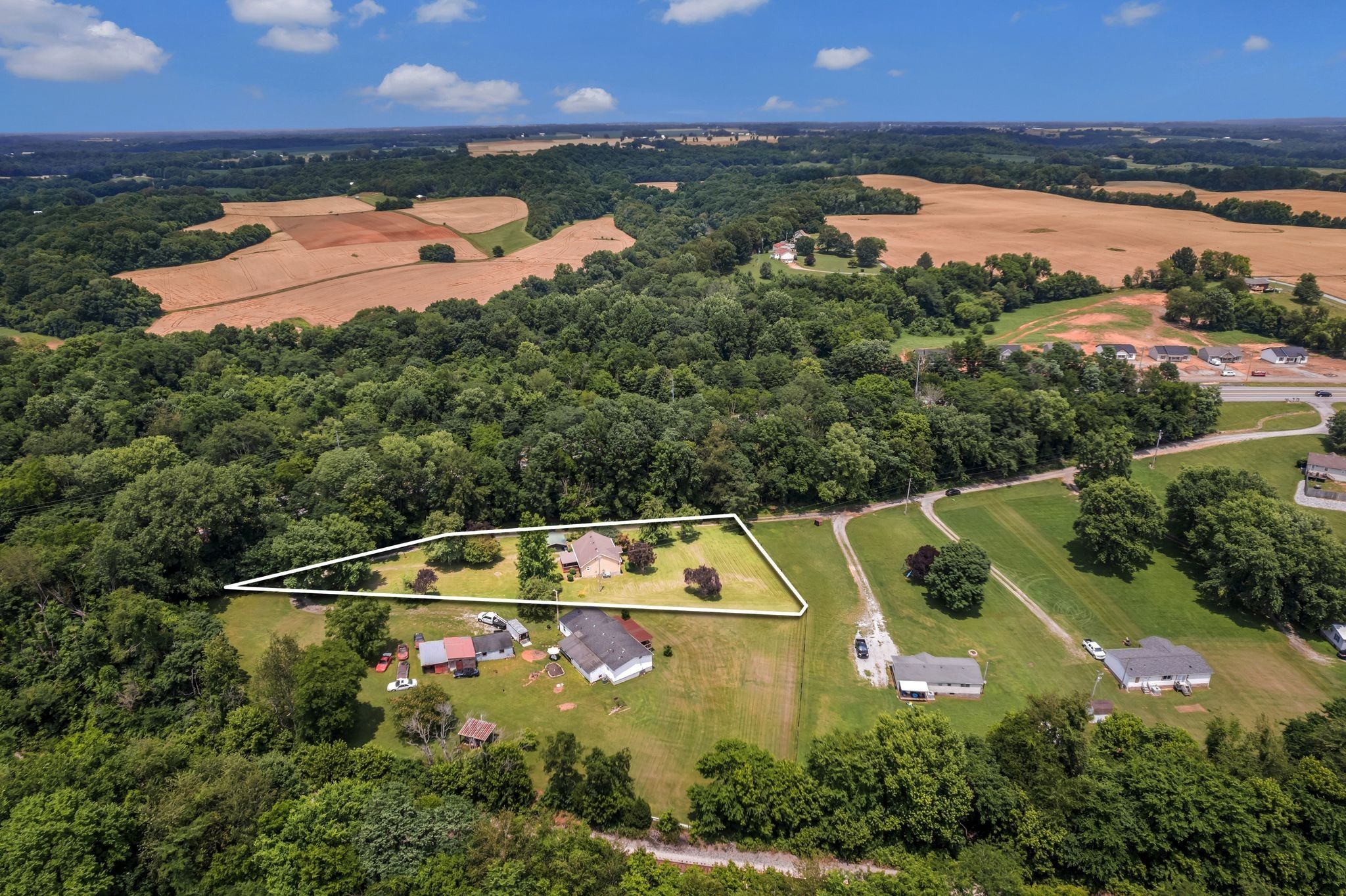 7898 Highway 41 Adams, TN 37010 - Photo 8 of 10 an aerial view of house with yard swimming pool and outdoor seating