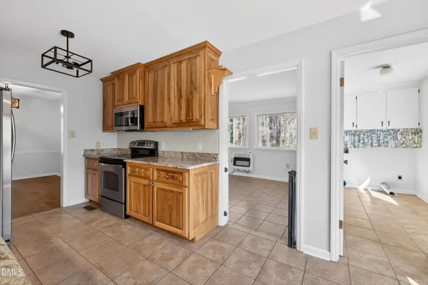 a view of a livingroom with wooden floor