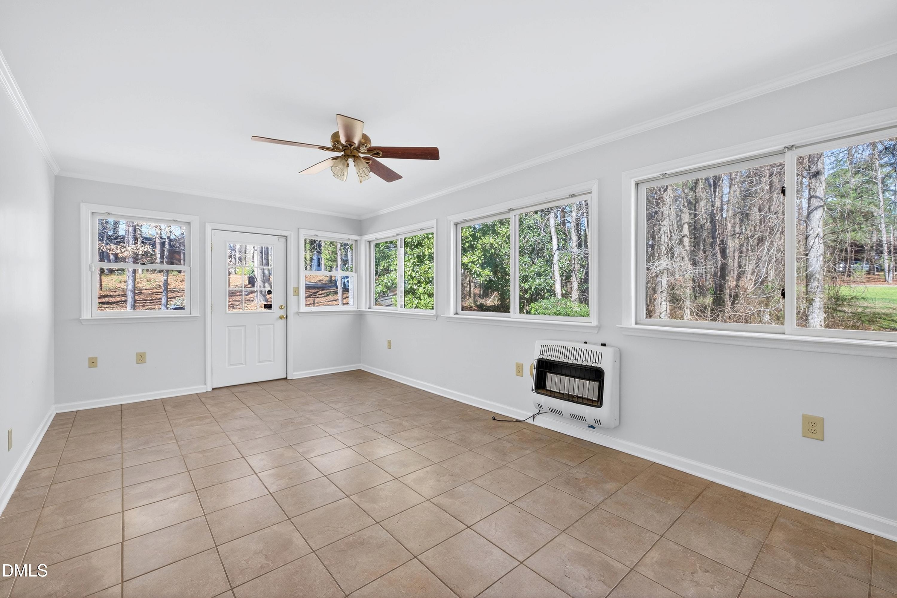 810 Woodland Road Creedmoor, NC 27522 - Photo 24 of 77 a view of an empty room with a window