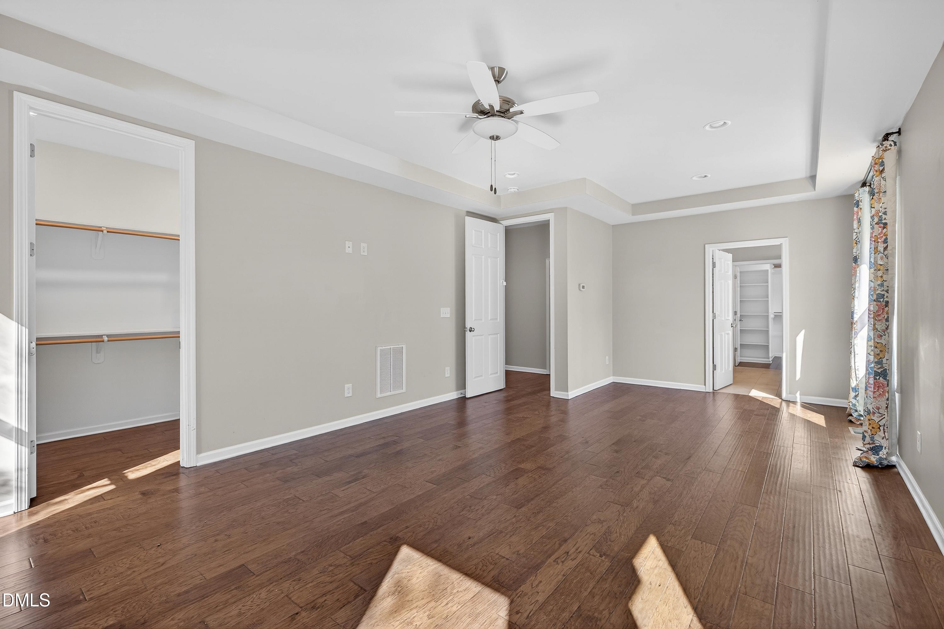 810 Woodland Road Creedmoor, NC 27522 - Photo 34 of 77 a view of a livingroom with wooden floor