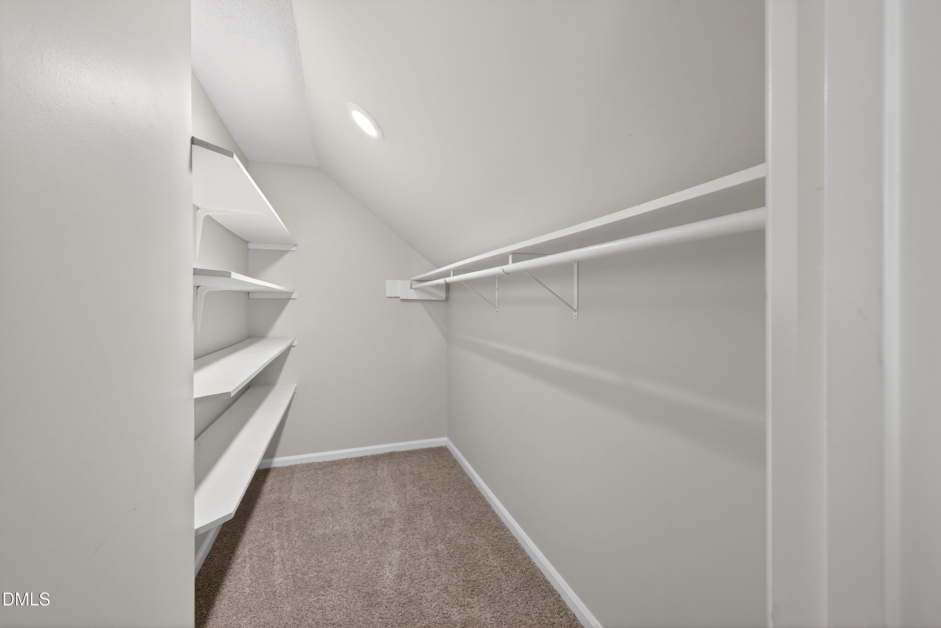 810 Woodland Road Creedmoor, NC 27522 - Photo 49 of 77 a view of an empty walk in closet