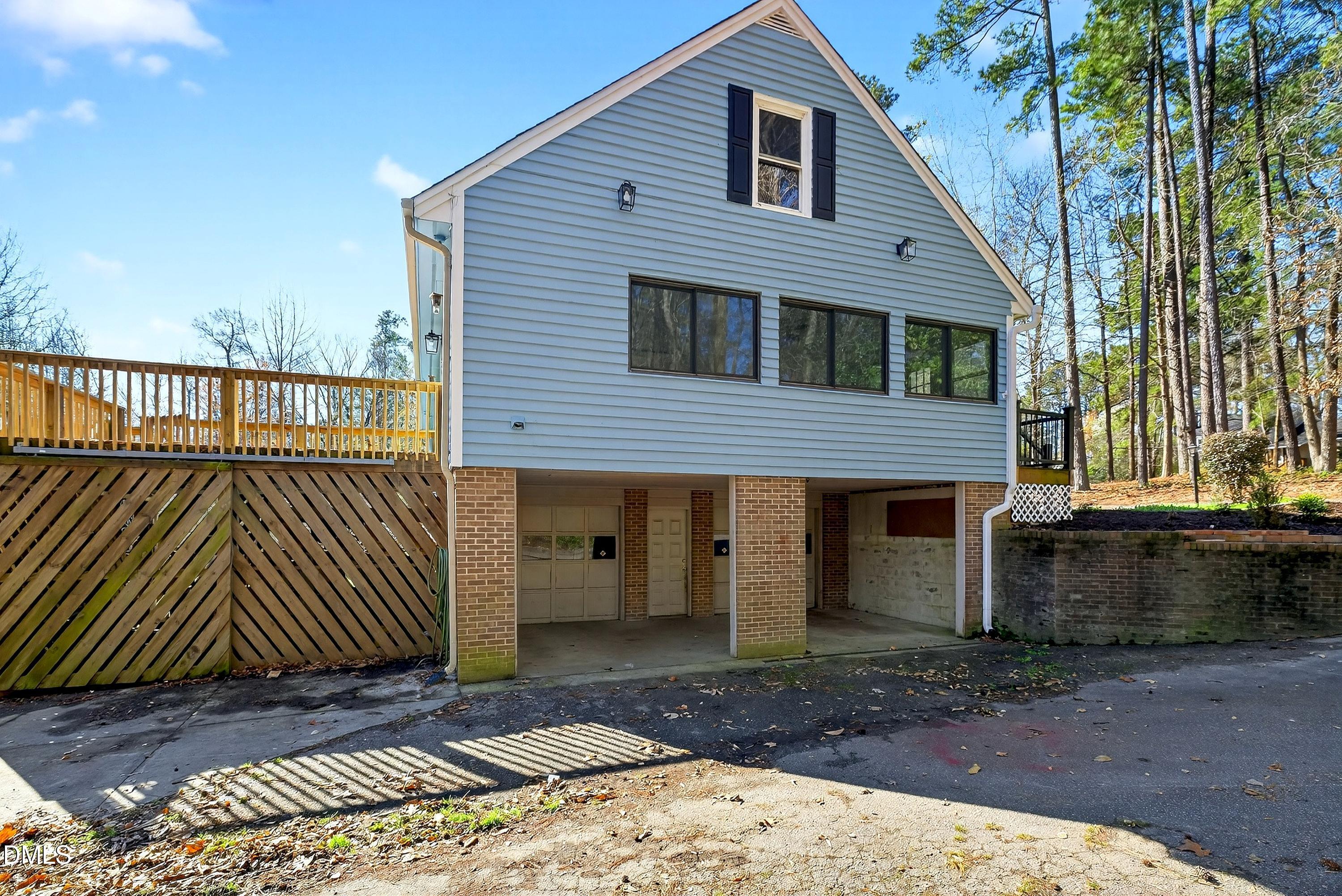 810 Woodland Road Creedmoor, NC 27522 - Photo 68 of 77 a front view of a house with a yard