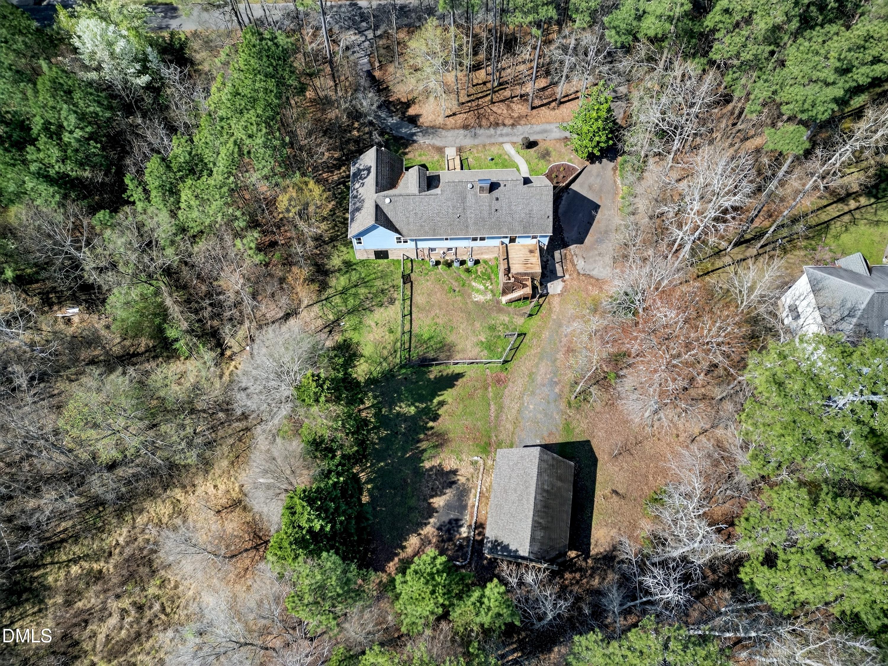810 Woodland Road Creedmoor, NC 27522 - Photo 72 of 77 an aerial view of a house with outdoor space