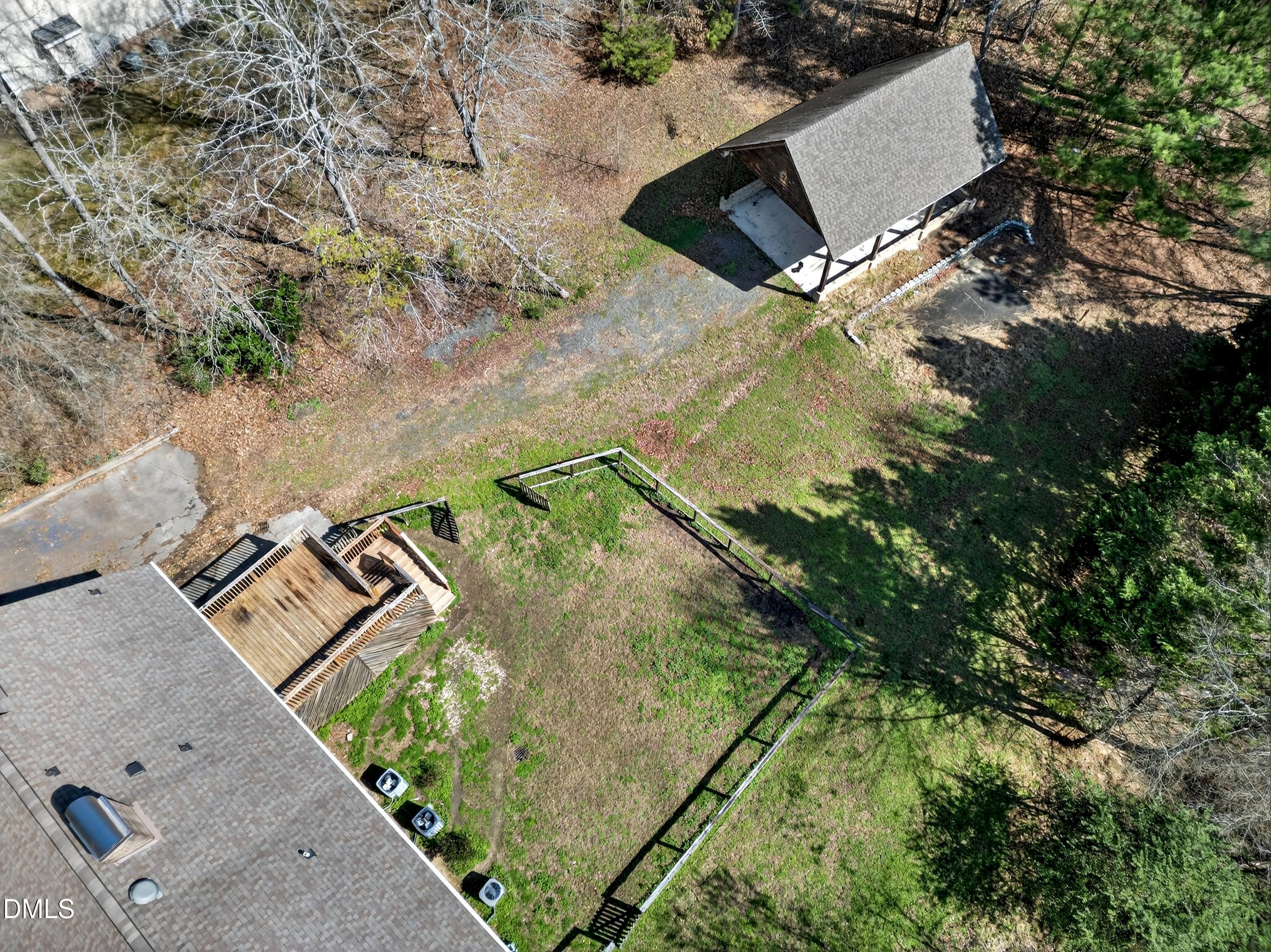 810 Woodland Road Creedmoor, NC 27522 - Photo 75 of 77 an aerial view of a house with a yard