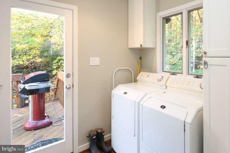 525 Clear Spring Road Great Falls, VA 22066 - Photo 11 of 30 a utility room with dryer and washer