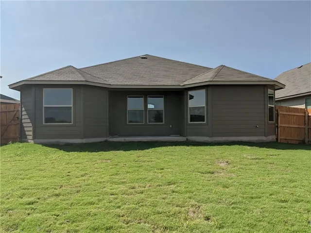 a house with garden in front of it