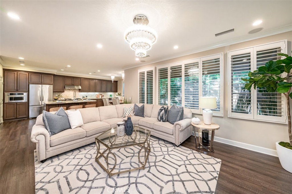 43 Lupari Irvine, CA 92618 - Photo 11 of 68 a living room with furniture and a large window