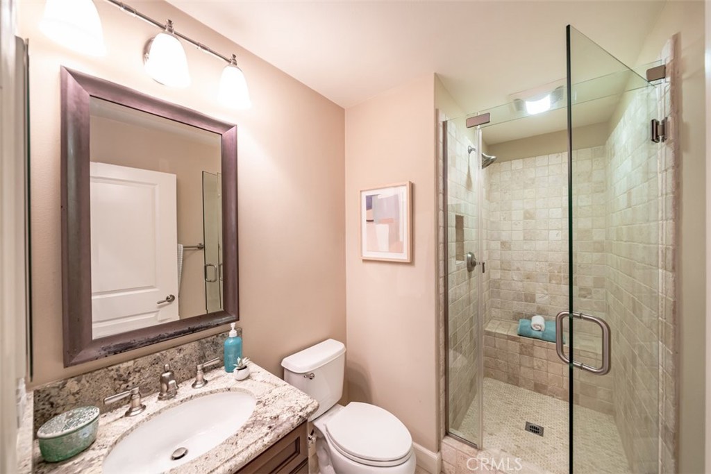 43 Lupari Irvine, CA 92618 - Photo 26 of 68 a bathroom with a sink a toilet and shower