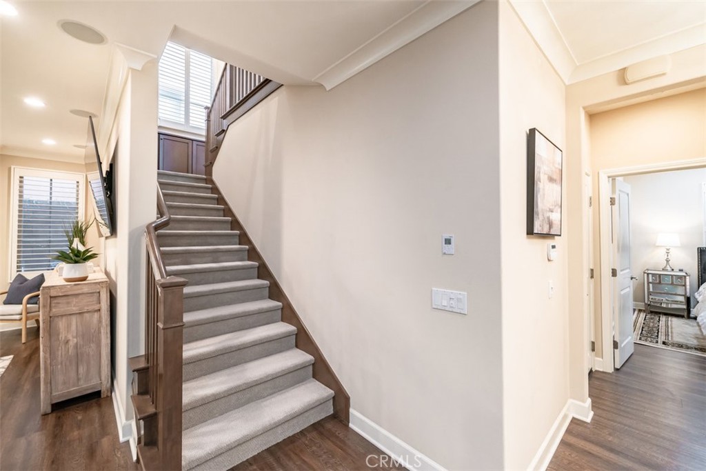 43 Lupari Irvine, CA 92618 - Photo 30 of 68 a view of a hallway with wooden floor and entryway