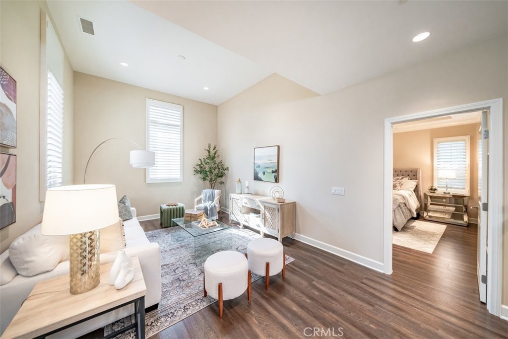 43 Lupari Irvine, CA 92618 - Photo 31 of 68 a living room with furniture and wooden floor