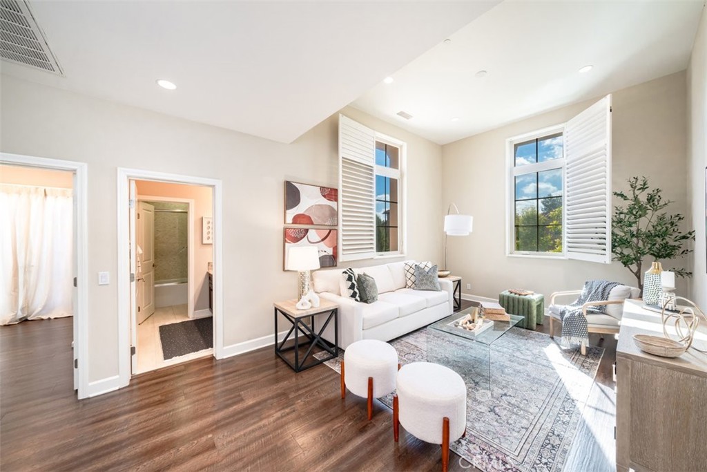 43 Lupari Irvine, CA 92618 - Photo 33 of 68 a living room with furniture and wooden floor
